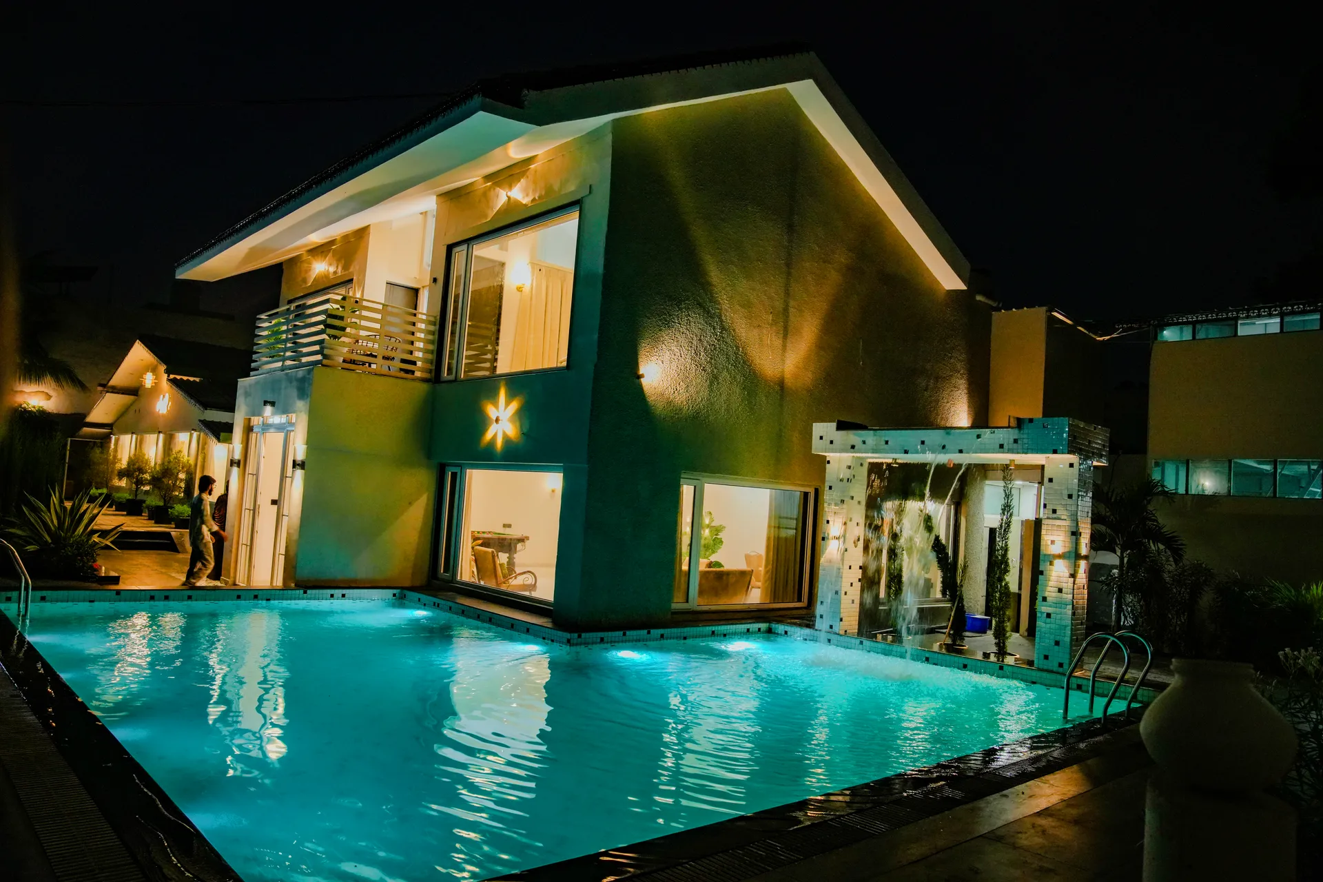 Pool, lounge and recreation spaces at Amber